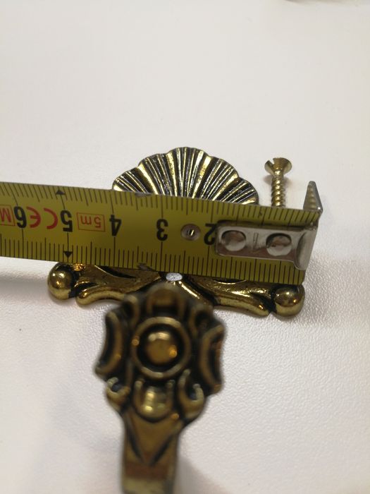 Gancho de parede para cortinado (alzapaños)