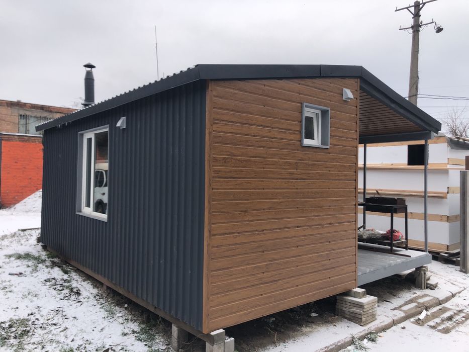 Модульний будинок з каміном.