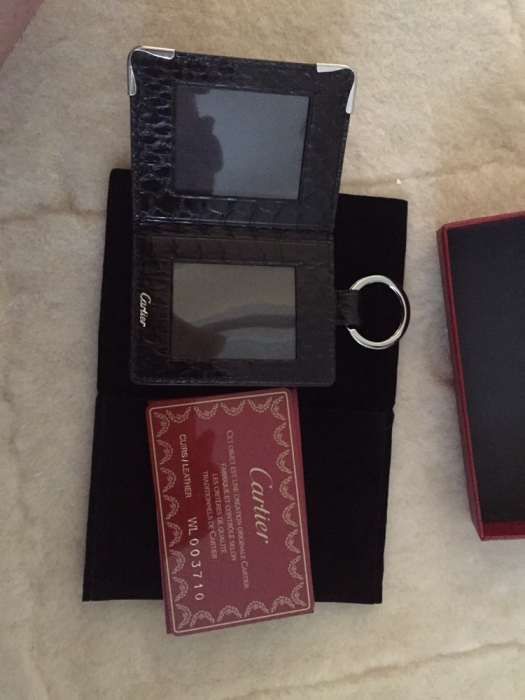 Excelente porta fotografias/porta-chaves