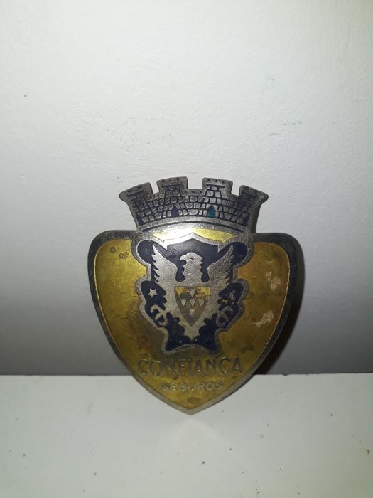 Crachá de companhia de seguros