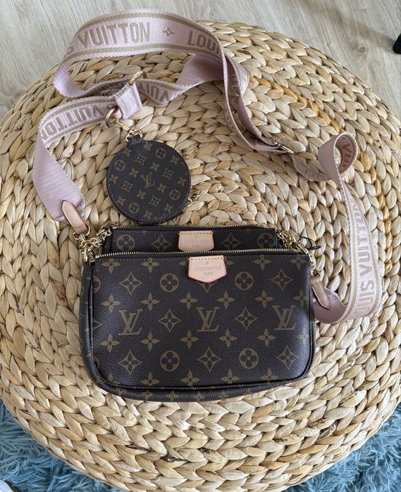 Mala Louis Vuitton com alça rosa
