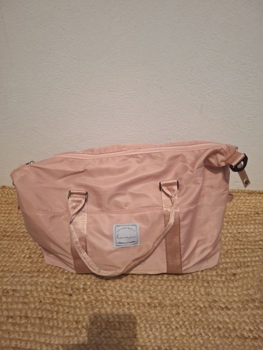 Mala rosa de senhora Haven