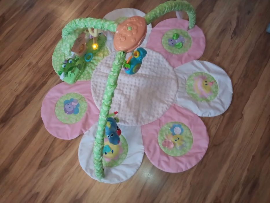 Interaktywna MATA EDUKACYJNA kwiatek FISHER PRICE grająca, świecąca