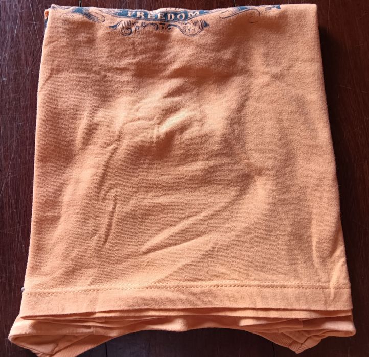 T shirt laranja infantil