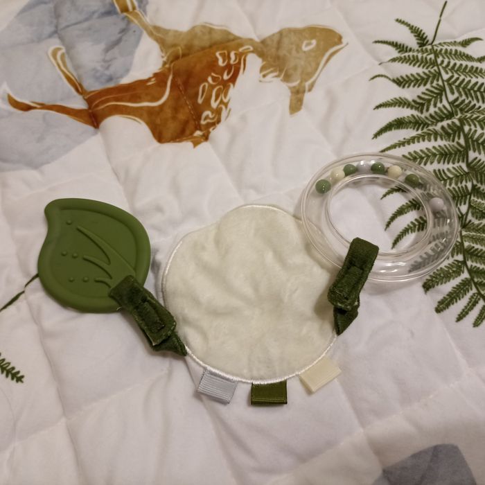 Сенсорний навчальний килимок Skiddou з помпонами