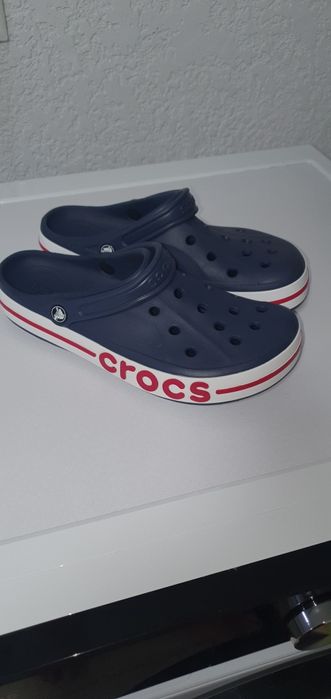 Нові Crocs тапочки оріг