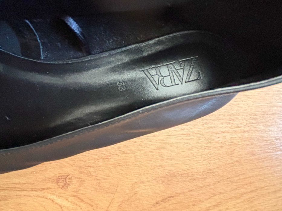 Sabrinas pretas em bom estado