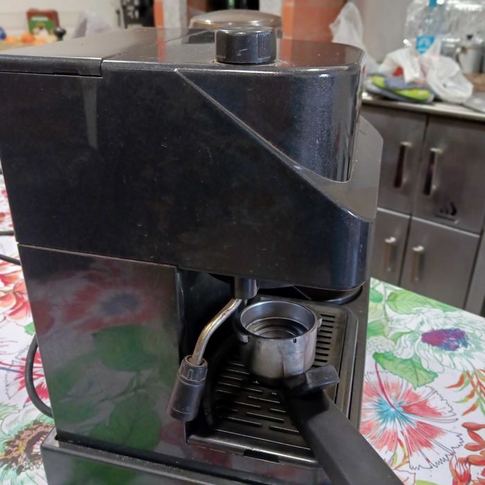 Máquina de café com muinho