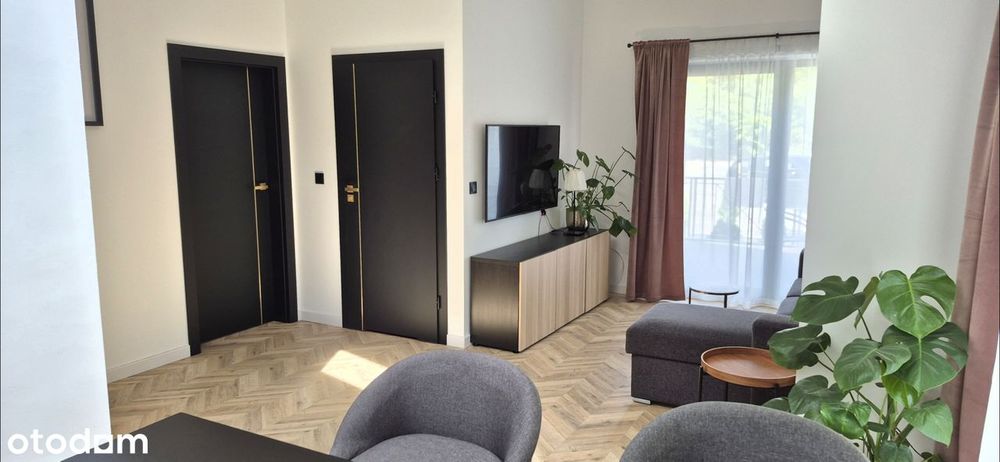 WYJĄTKOWY APARTAMENT z ogródkiem i przestronnym tarasem.