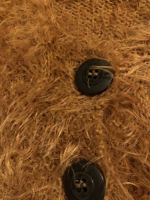 Calças largas  bolsos laterais e casaco com pelo