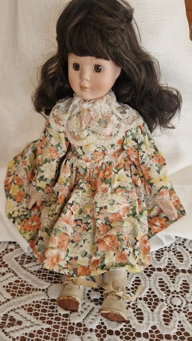 Bonecas em porcelana