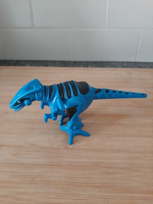 Dinossauro azul e preto