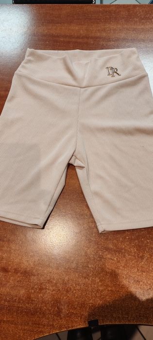 Nowe legginsy beżowe