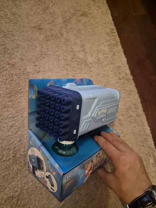 Brinquedo Pistola de sabão com LED + recarga