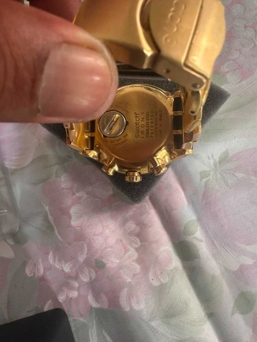Relógio Swatch cifrão