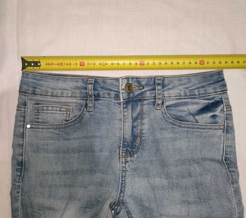 P106 Spodnie jeansowe Diverse r. 34