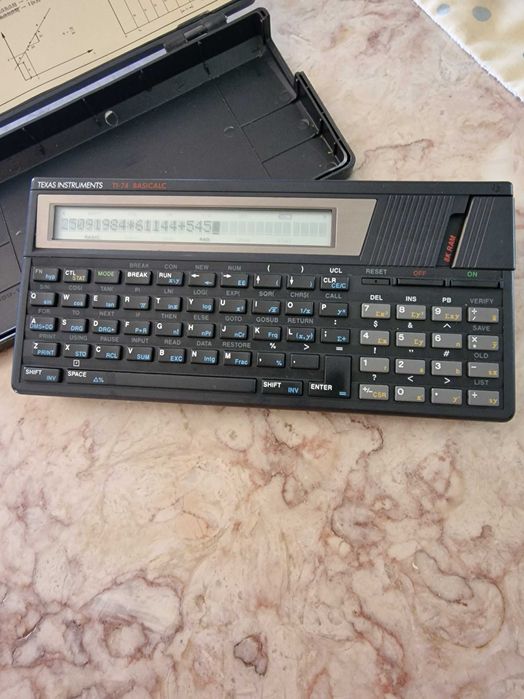 Texas Instruments TI-74 BASICALC Calculator64564315027202121