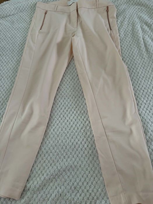 Eleganckie spodnie Reserved rozmiar 42/44.