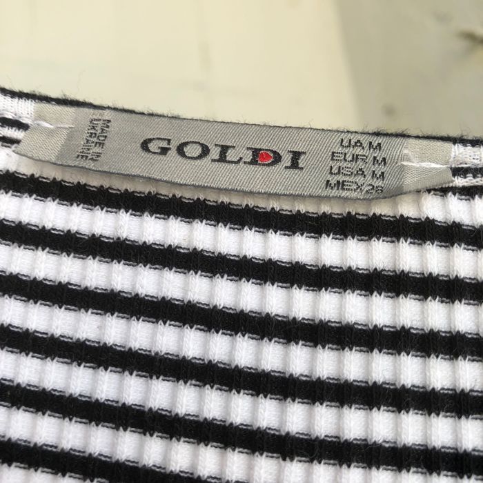 Новое Goldi платье по талии