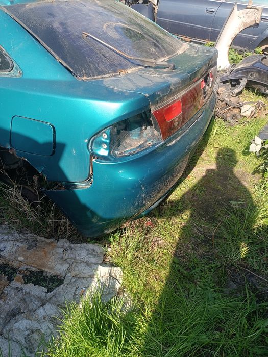 Задній бампер Mazda 323 BA