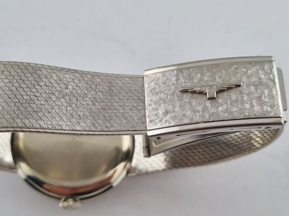 Золотые часы longines