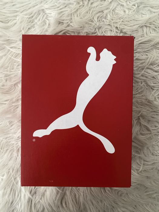 Білі кросівки puma