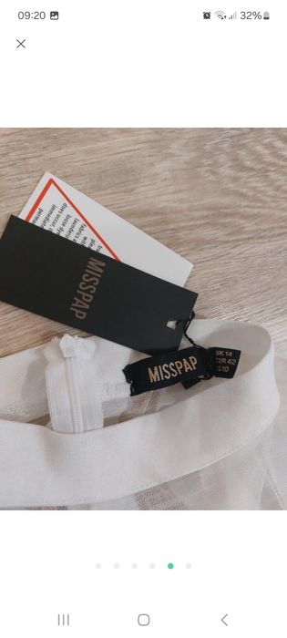 Святкова сукня з пір'ям