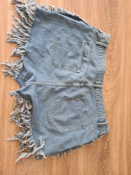 Szerokie szorty modne frędzle spodenki jeansowe 2xl