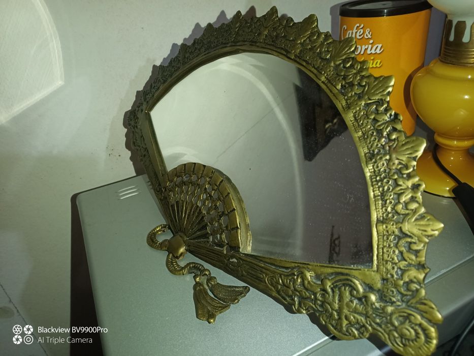 Espelho em latão mede largura 40cm altura  24cm