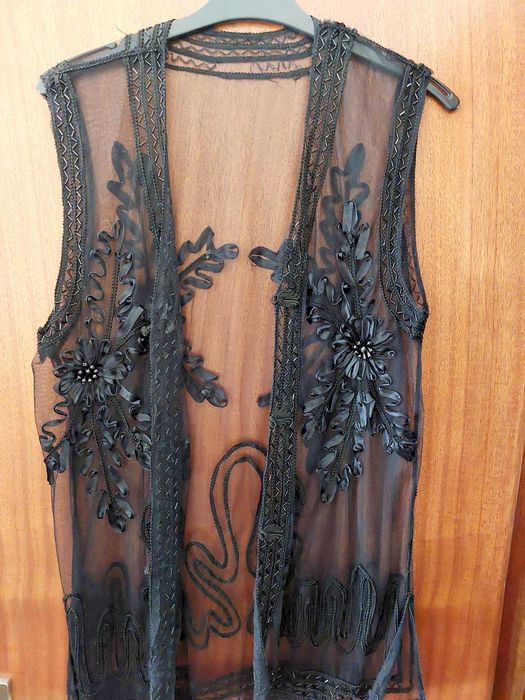 Túnica preta transparente