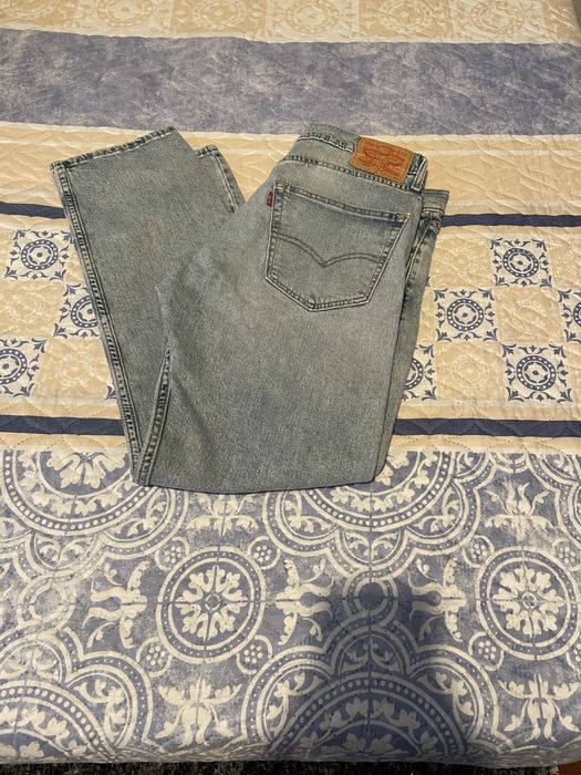 Calças levis modelo 502