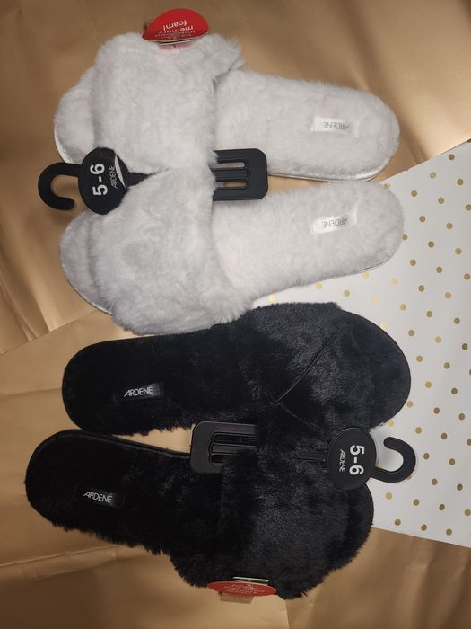 Продам домашние тапочки  Ardene.