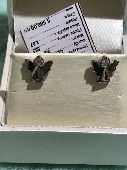 Очень оригинальные золотые серьги в белом золоте на закрутках!