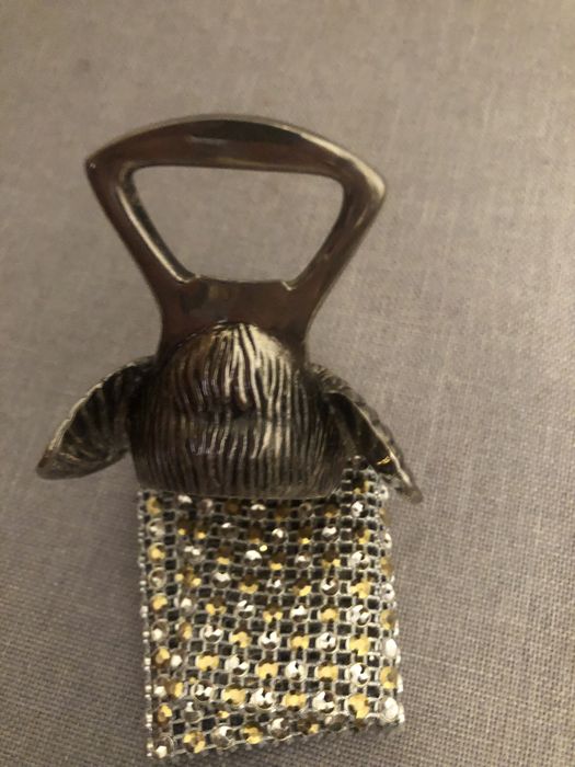 Abre capsulas garrafas