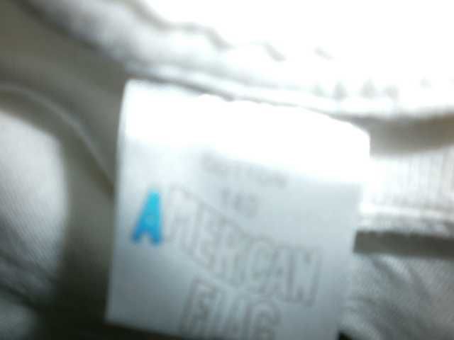 biała koszulka r.140