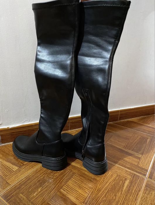 Botas a cima do joelho