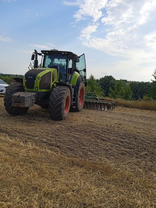 Трактор Claas Axion 950 2012  Продаж
