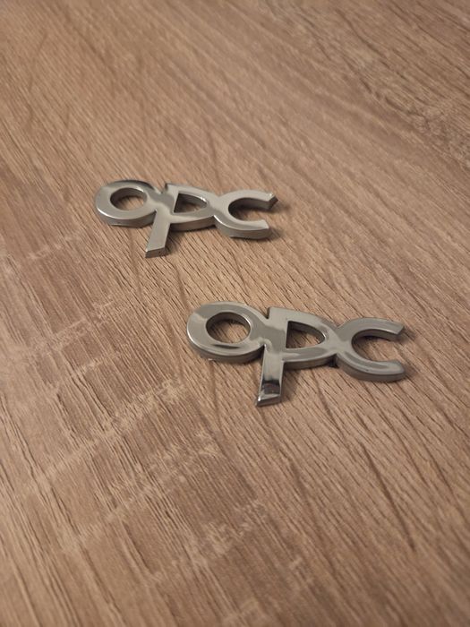 2 Emblemas laterais OPC Originais