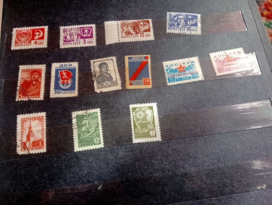 Альбом 30Х21 . Марки (флора.фауна,інше 180шт).