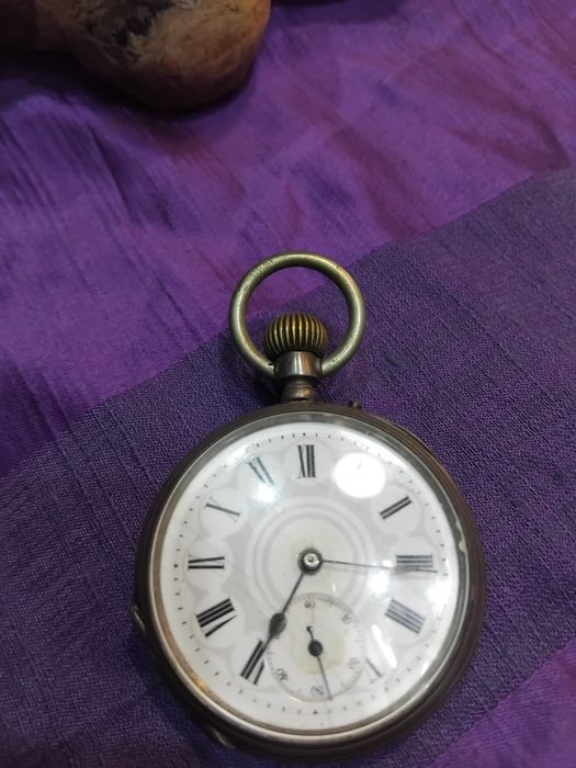 Relojio de bolso de homem em prata  a funciunar