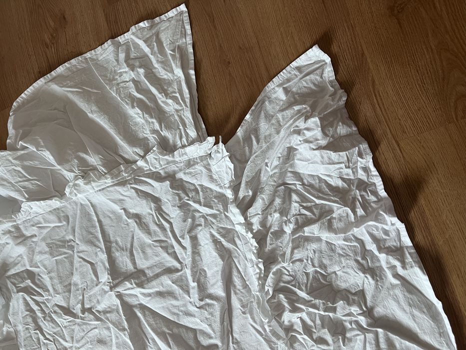 Przescieradło maskujące z falbanką do łóżeczka białe