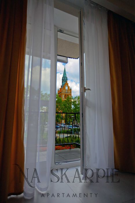 Apartament Na Skarpie 1 - noclegi nad jeziorem, promenada, Mazury