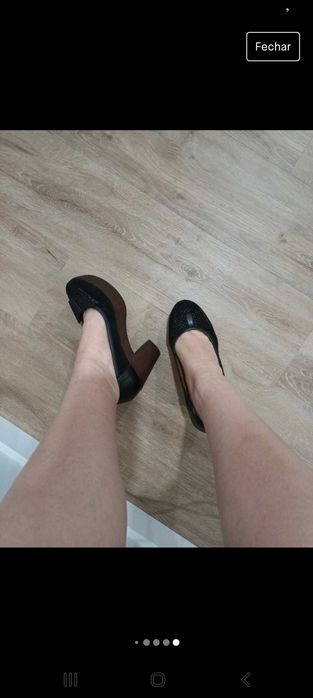 Sapatos pretos tacão alto