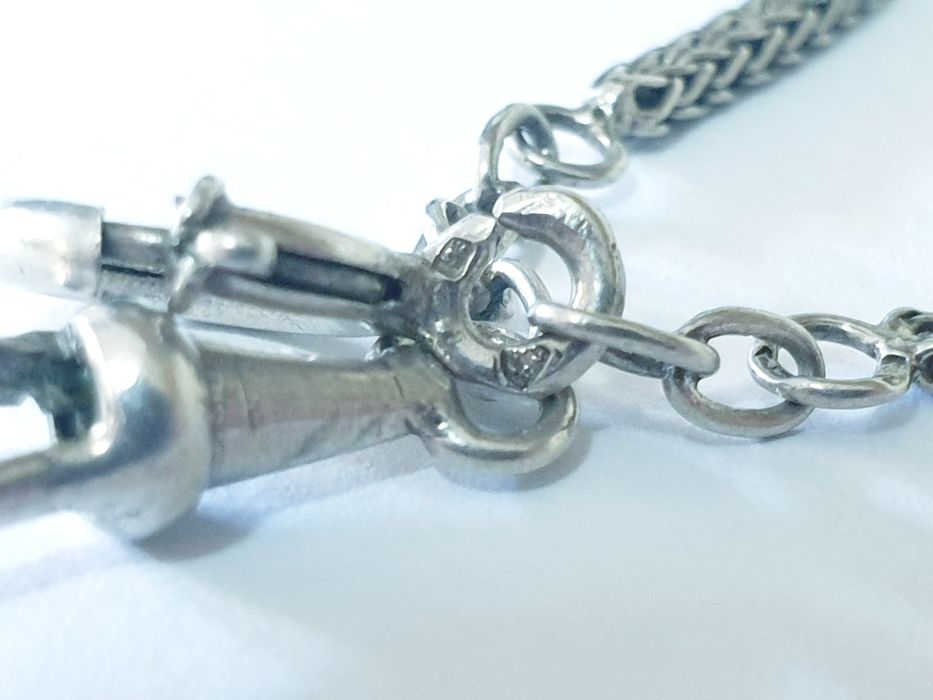 Antigo corrente de relógio de bolso em prata contrastada