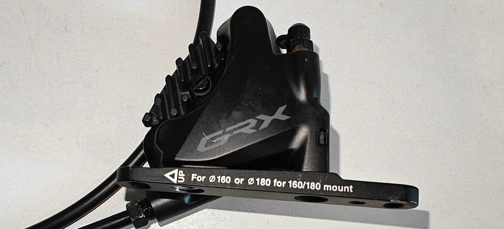 Zacisk hamulca tarczowego Shimano GRX BR-RX400 NOWY
