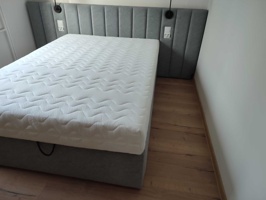 łóżko tapicerowane, pojemnik, szerokie wezgłowie, producent 140 x 200