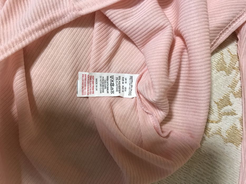 Жіноче боді в рубчик