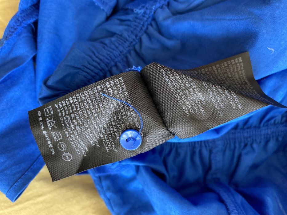 Kombinezon niebieski z falbanami M krótkie spodenki na ramiączkach H&M