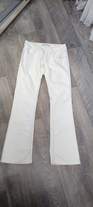 Джинси кльош на 42 розмір