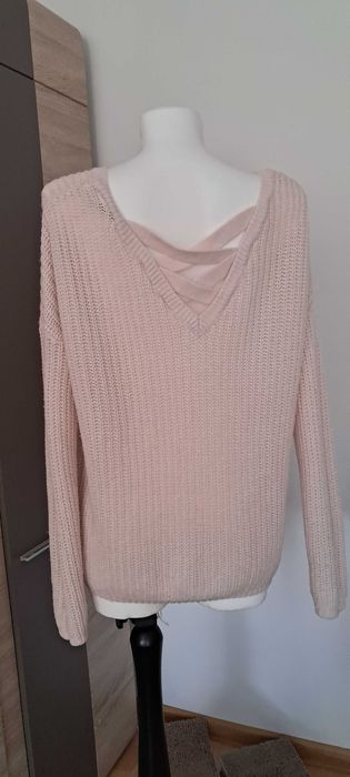 Sweter różowy...